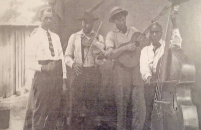 Bluejack playing banjo at a Virginia gathering